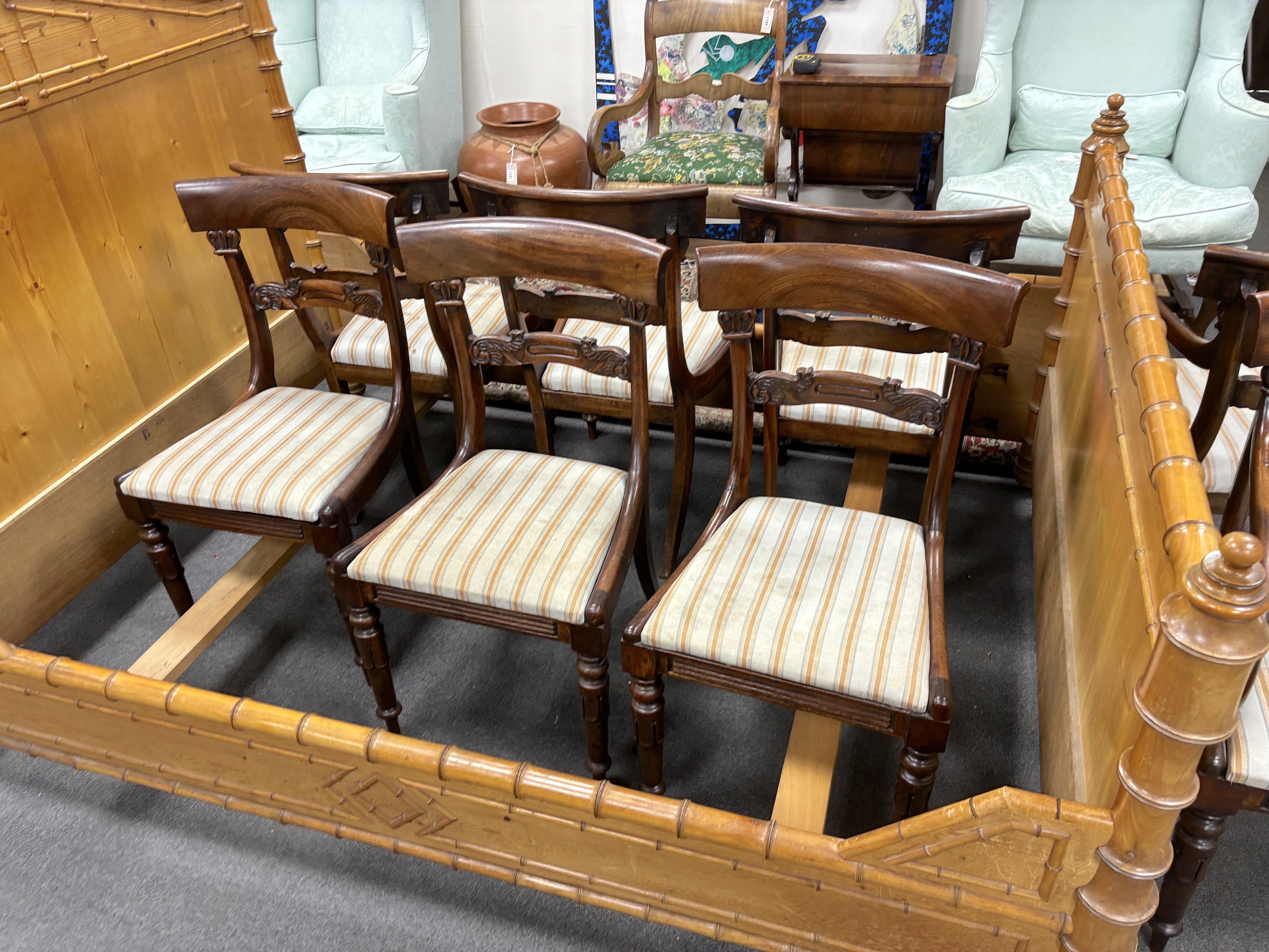 A set of eight William IV mahogany dining chairs, two with arms